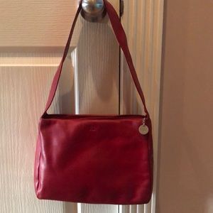 Beautiful red leather Sak bag shoulder strap